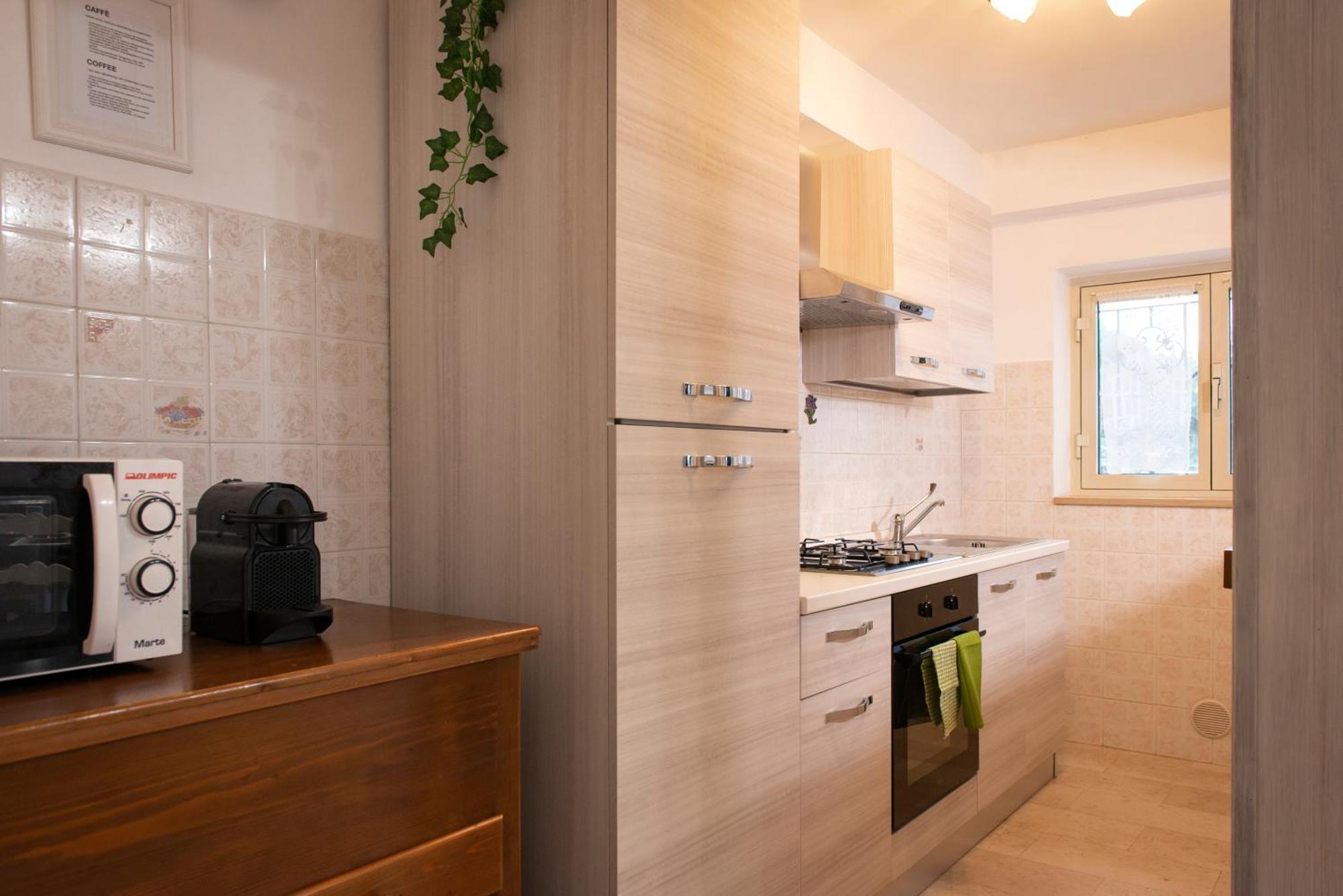 Appartamento Con Parcheggio E Giardino Asís Exterior foto